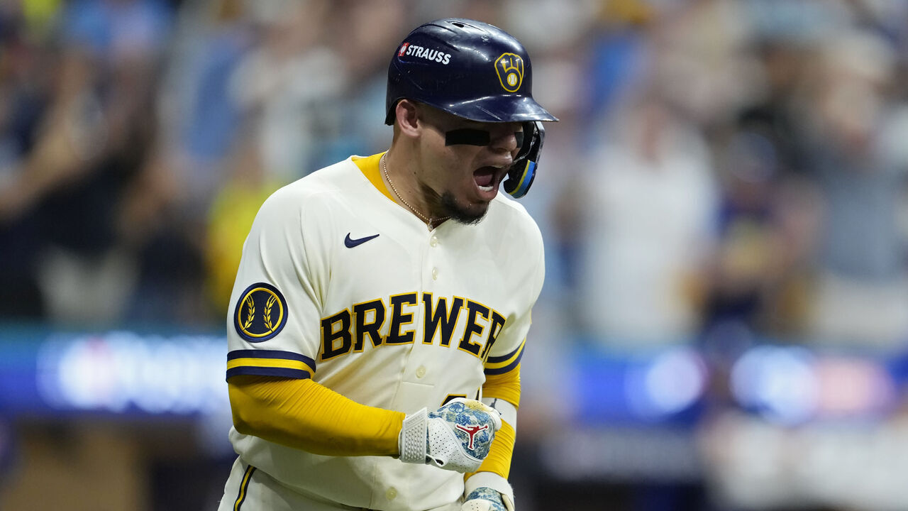 MILWAUKEE, WISCONSIN - OCTOBER 12: William Contreras #24 of the Milwaukee Brewers reacts to hitting a single in the sixth inning against the Los Angeles Dodgers in game two of the National League Championship Series at American Family Field on October 12, 2026 in Milwaukee, Wisconsin.