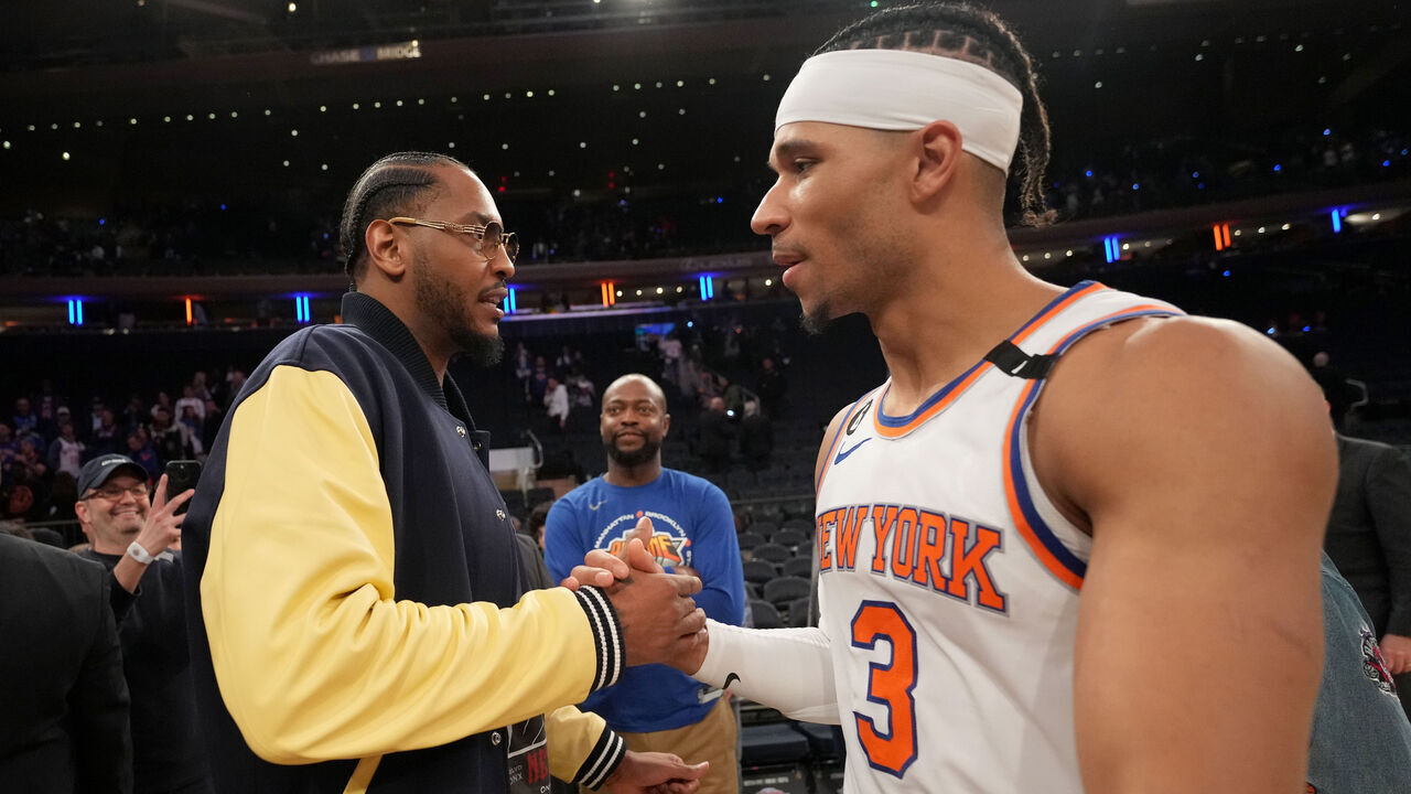 NEW YORK, NY - MAY 2: Carmelo Anthony embraces Josh Hart #3 of the New York Knicks after the game against the Miami Heat during Game Two of the Eastern Conference Semi-Finals of the 2023 NBA Playoffs on May 2, 2023 at Madison Square Garden in New York City, New York. Mandatory Copyright Notice: Copyright 2023 NBAE