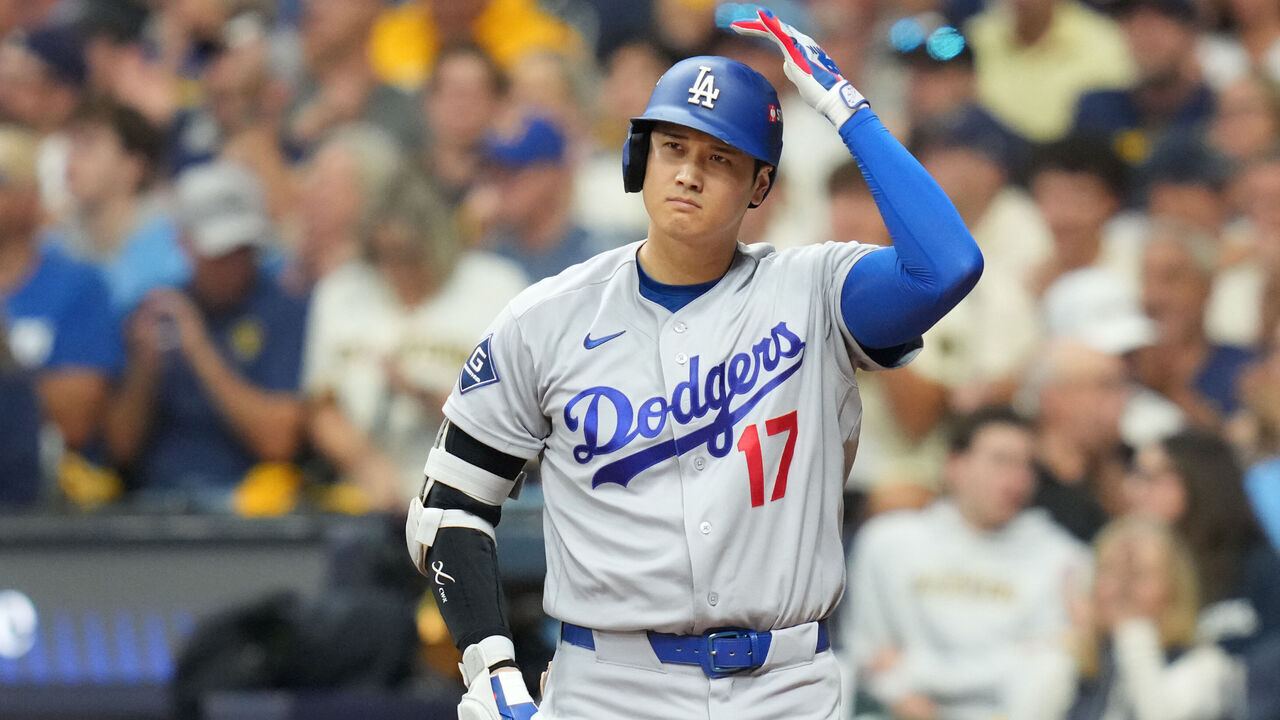 MILWAUKEE, WISCONSIN - OCTOBER 11: Shohei Ohtani #17 of the Los Angeles Dodgers walks to the plate during the third inning against the Milwaukee Brewers in game one of the National League Championship Series at American Family Field on October 11, 2026 in Milwaukee, Wisconsin.
