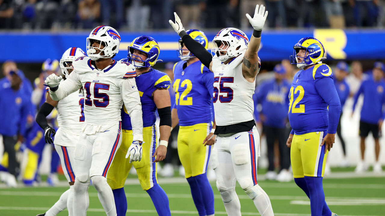 INGLEWOOD, CALIFORNIA - OCTOBER 12: Greg Rousseau #15 and Michael Hoecht #55 of the Buffalo Bills react after a blocked field goal during overtime against the Los Angeles Rams at SoFi Stadium on October 12, 2026 in Inglewood, California.