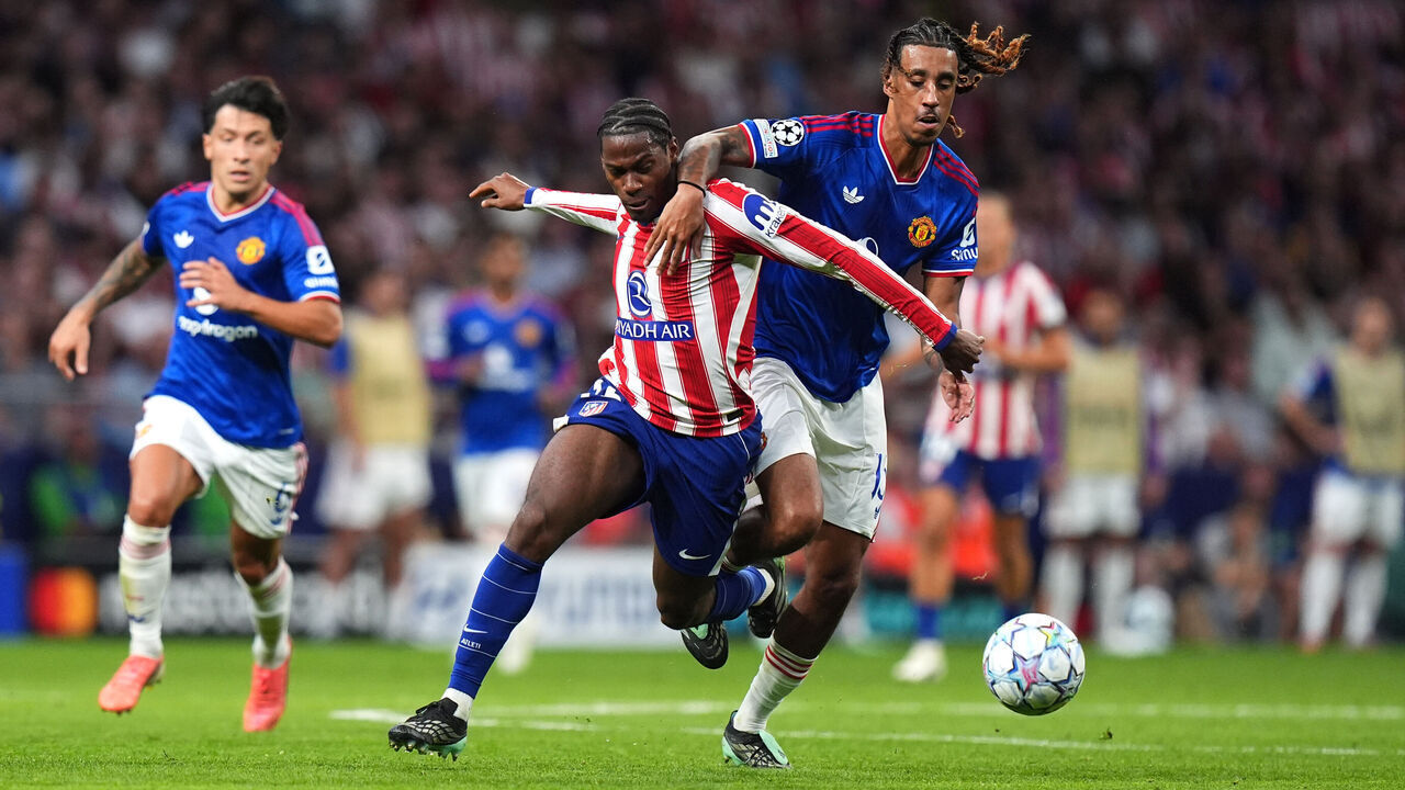 MADRID, SPAIN - OCTOBER 13: Jonathan David of Atletico Madrid is fouled by Leny Yoro of Manchester United which later results in a red card during the UEFA Champions League 2026/27 League Phase MD2 match between Atletico de Madrid and Manchester United at Estadio Metropolitano on October 13, 2026 in Madrid, Spain.