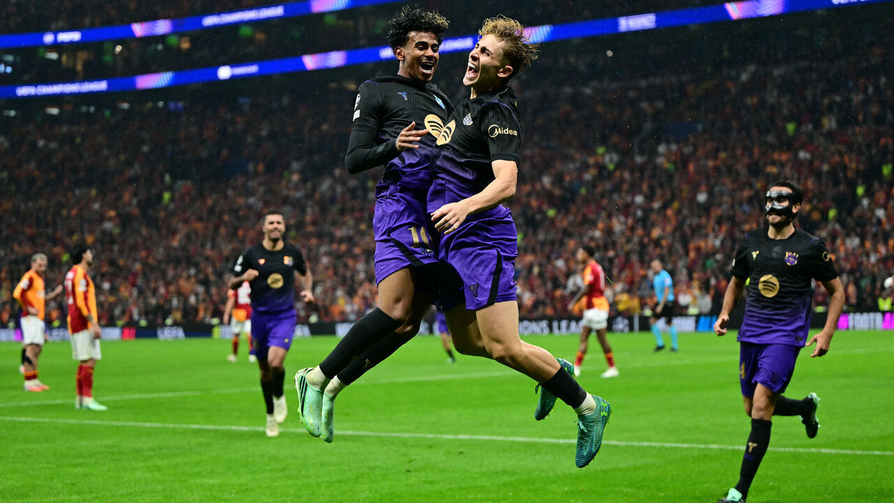 Barcelona's Spanish midfielder #07 Fermin Lopez (CR) celebrates with Barcelona's Spanish forward #10 Lamine Yamal (CL) after scoring Barcelona's second goal during the UEFA Champions League, league phase matchday 2, football match between Galatasaray and Barcelona at the Ali Sami Yen Sports Complex in Istanbul on October 13, 2026.
