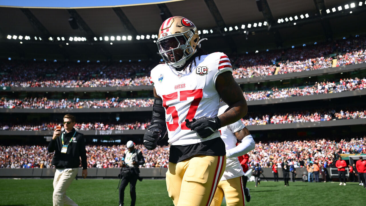MELBOURNE, AUSTRALIA - SEPTEMBER 11: Dre Greenlaw #57 of the San Francisco 49ers runs onto the field prior to the NFL football game against the Los Angeles Rams at the Melbourne Cricket Ground on September 11, 2026 in Melbourne, Australia.