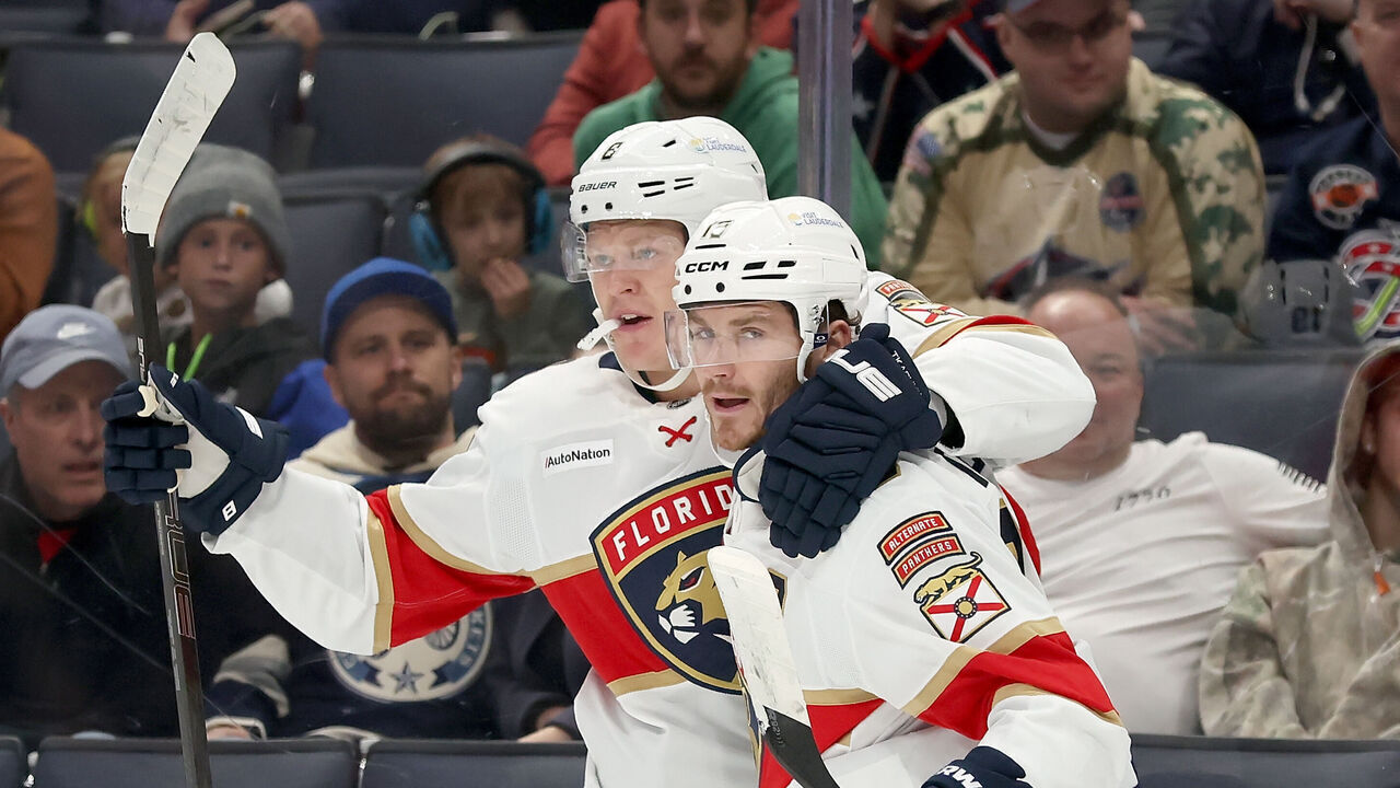 COLUMBUS, OHIO - OCTOBER 13: Brady Tkachuk #8 of the Florida Panthers is congratulated by Matthew Tkachuk #19 after scoring a goal during the second period of the game against the Columbus Blue Jackets at Nationwide Arena on October 13, 2026 in Columbus, Ohio.