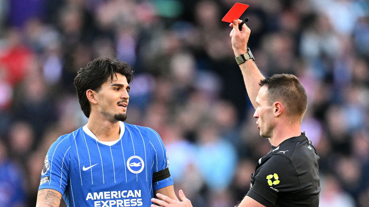 Referee Thomas Bramall shows a red card to Brighton's Dutch defender #04 Pascal Struijk during the English Premier League football match between Sunderland and Brighton and Hove Albion at The Stadium of Light in Sunderland in north east England on October 10, 2026. / RESTRICTED TO EDITORIAL USE. No use with unauthorized audio, video, data, fixture lists, club/league logos or 'live' services. Online in-match use limited to 120 images. An additional 40 images may be used in extra time. No video emulation. Social media in-match use limited to 120 images. An additional 40 images may be used in extra time. No use in betting publications, games or single club/league/player publications. /