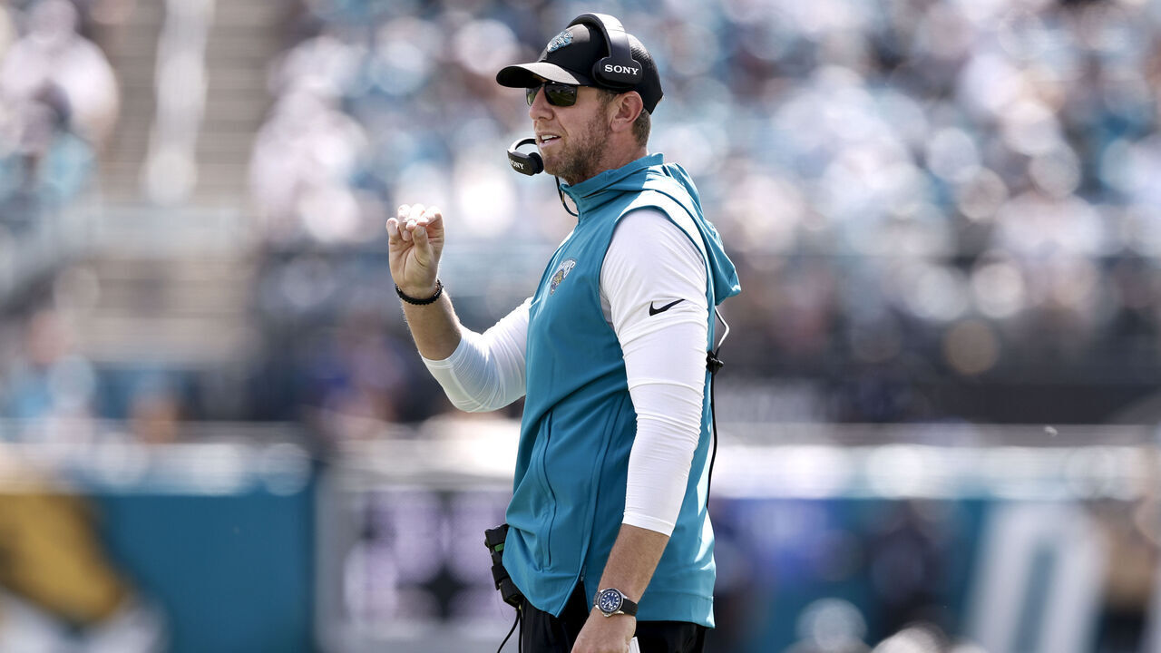 JACKSONVILLE, FL - SEPTEMBER 27: Head Coach Liam Coen of the Jacksonville Jaguars calls a play from the sidelines during the first half of the game against the New England Patriots at EverBank Stadium on September 27, 2026 in Jacksonville, Florida.