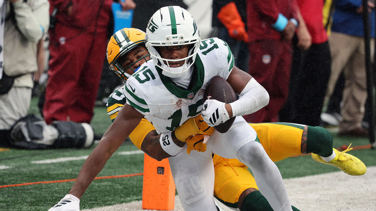 EAST RUTHERFORD, NEW JERSEY - SEPTEMBER 20: Wide Receiver Adonai Mitchell #15 of the New York Jets strains to extend the play in the game between the Green Bay Packers vs the New York Jets at MetLife Stadium on September 20, 2026 in East Rutherford, New Jersey.