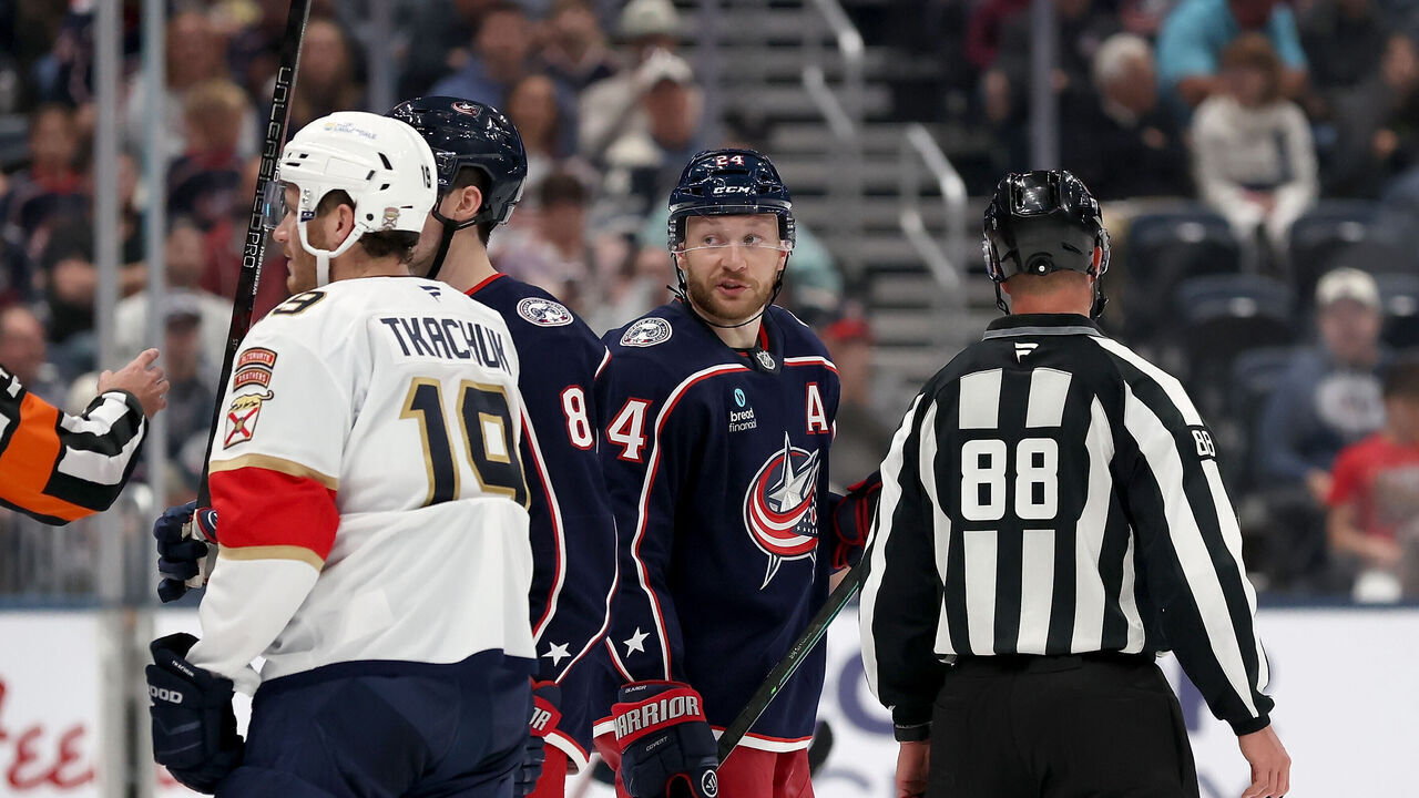 COLUMBUS, OHIO - OCTOBER 13: Referee Mike Sullivan #47 sends ejects Mathieu Olivier #24 of the Columbus Blue Jackets after giving him a five minute major and 10 minute game misconduct penalty during the second period of the game against the Florida Panthers at Nationwide Arena on October 13, 2026 in Columbus, Ohio.