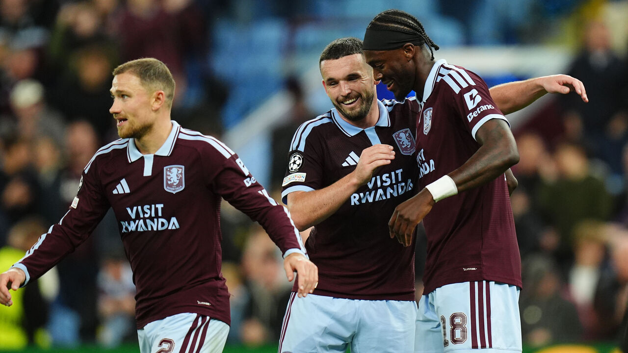 Aston Villa's Tammy Abraham (right) celebrates with team-mate John McGinn after scoring their side's sixth goal of the game during the UEFA Champions League, league phase match at Villa Park, Birmingham. Picture date: Wednesday October 14, 2026.