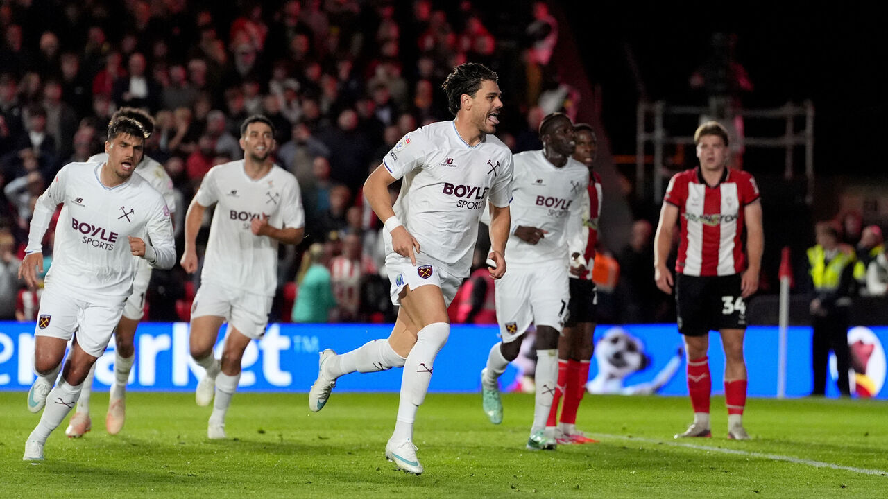West Ham United's Konstantinos Mavropanos (centre) celebrates after scoring his sides first goal during the Sky Bet Championship match at the ProAmpac Stadium, Lincoln. Picture date: Wednesday October 14, 2026.