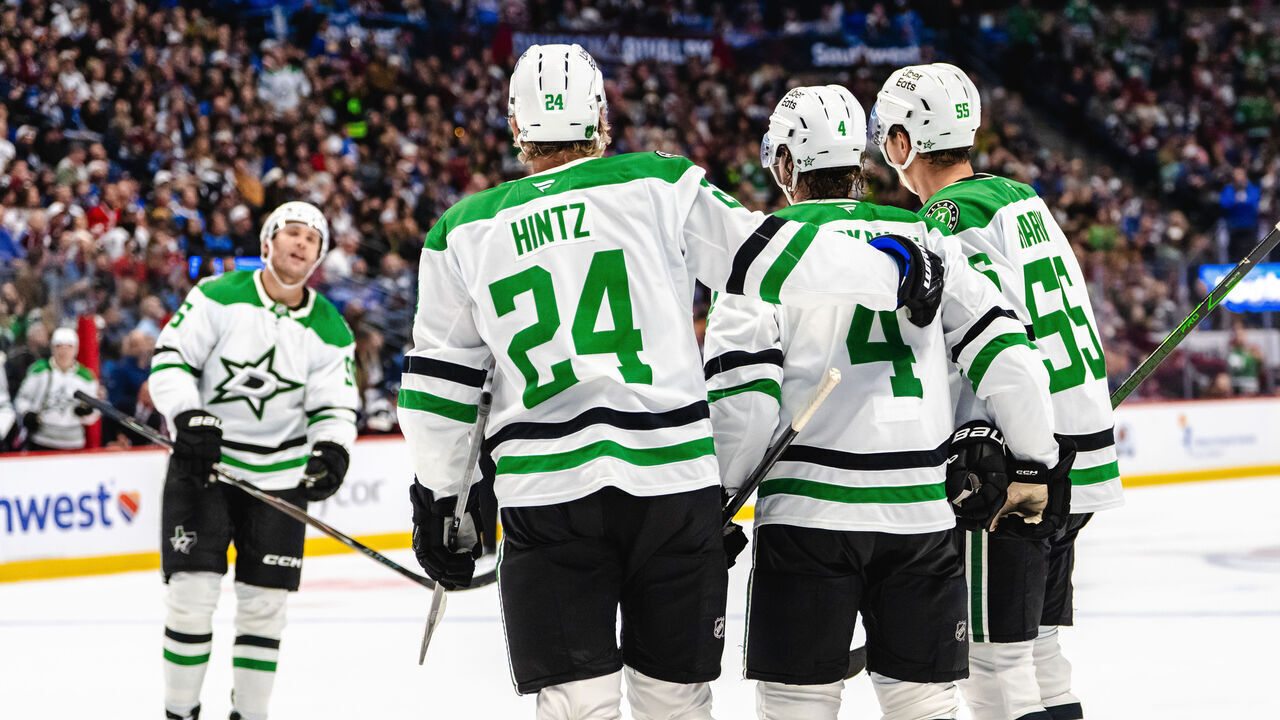 DENVER, COLORADO - OCTOBER 14: Roope Hintz #24, Miro Heiskanen #4 and Thomas Harley #55 of the Dallas Stars celebrate Heiskanen's second period goal against the Colorado Avalanche at Ball Arena on October 14, 2026 in Denver, Colorado.