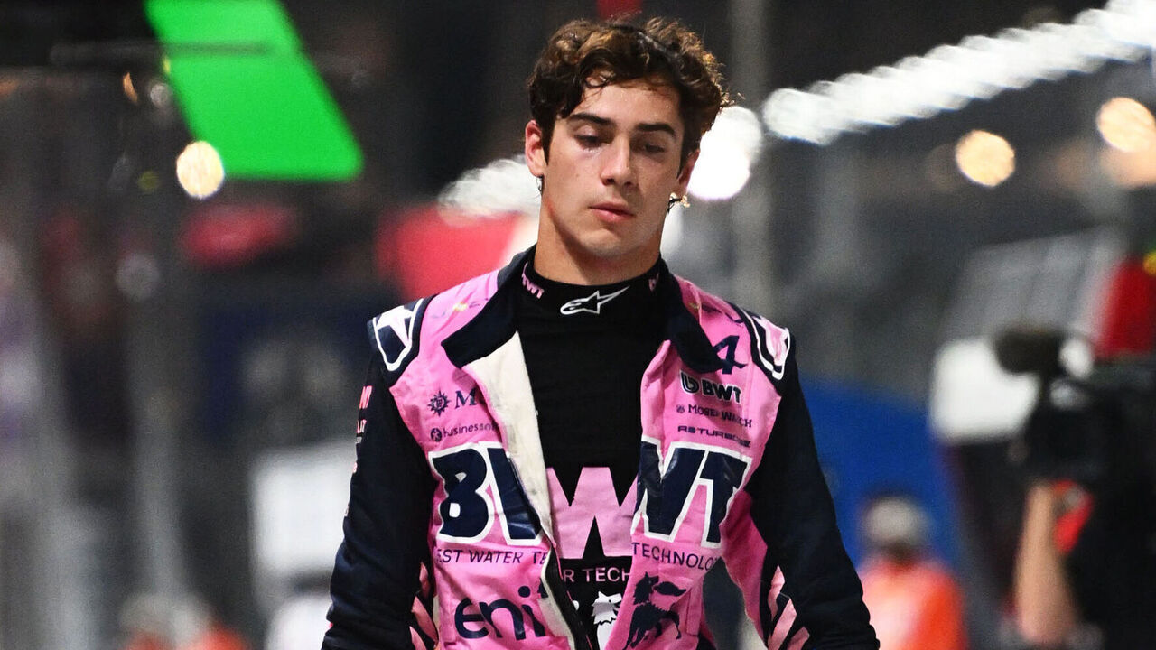 SINGAPORE, SINGAPORE - OCTOBER 10: Sixteenth placed qualifier Franco Colapinto of Argentina and Alpine F1 walks in the Pitlane during qualifying ahead of the F1 Grand Prix of Singapore at Marina Bay Street Circuit on October 10, 2026 in Singapore, Singapore.