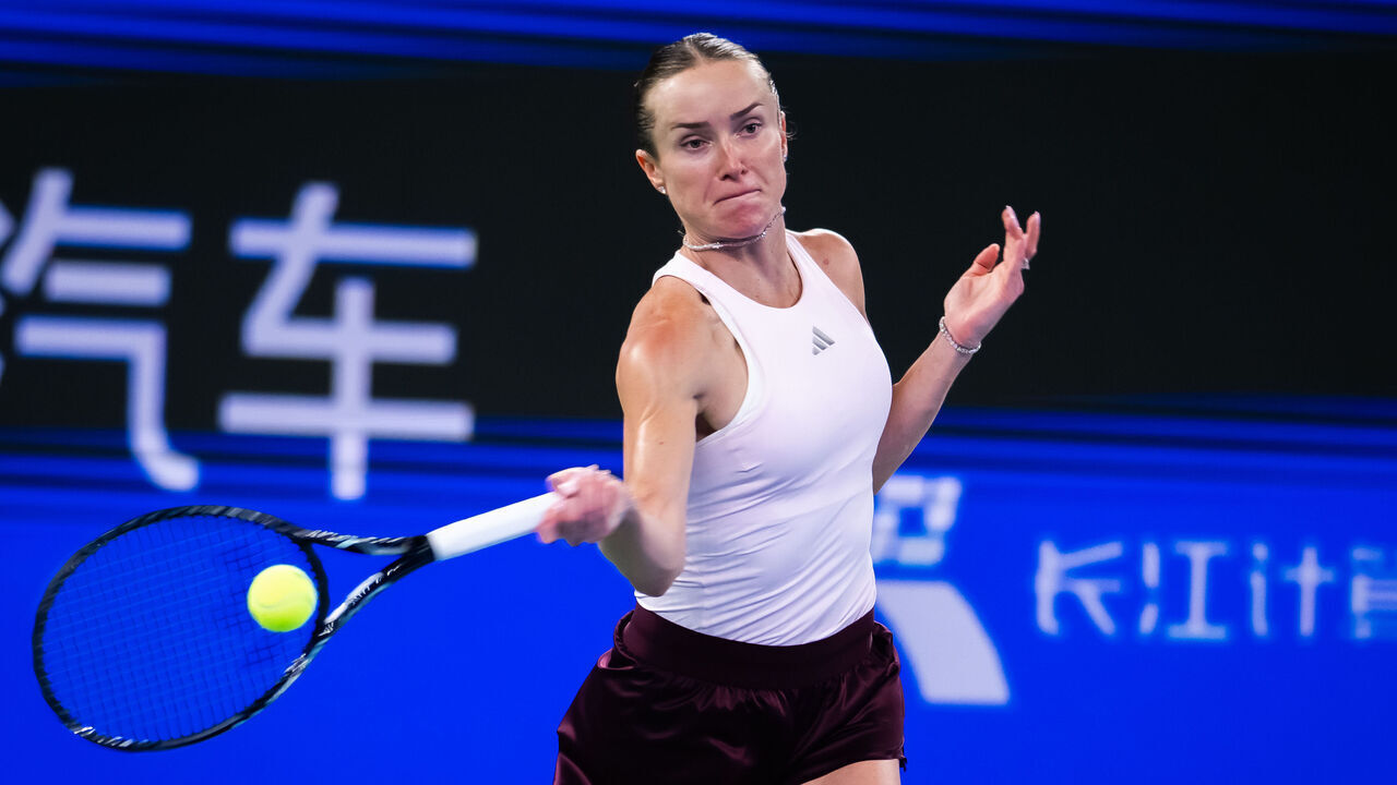 WUHAN, CHINA - OCTOBER 15: Elina Svitolina of Ukraine in action against Hanyu Guo of China in the third round on Day 4 of the Wuhan Open at Optics Valley International Tennis Center on October 15, 2026 in Wuhan, China