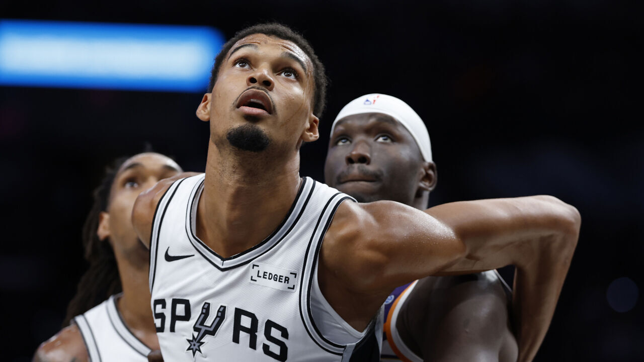 SAN ANTONIO, TX - OCTOBER 14: Victor Wembanyama #1 of the San Antonio Spurs looks to rebound against the Phoenix Suns in the second half of a preseason game at Frost Bank Center on October 14, 2026 in San Antonio, Texas. NOTE TO USER: User expressly acknowledges and agrees that, by downloading and or using this photograph, User is consenting to terms and conditions of the Getty Images License Agreement.