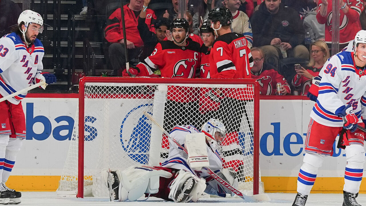 NEWARK, NJ - OCTOBER 15: Nico Hischier #13 of the New Jersey Devils celebrates his goal with teammates during the second period of the game against the New York Rangers on October 15, 2026 at the Prudential Center in Newark, New Jersey.