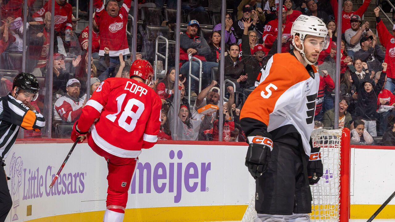 DETROIT, MICHIGAN - OCTOBER 15: Andrew Copp #18 of the Detroit Red Wings celebrates his goal on Joseph Woll #53 of the Philadelphia Flyers (not pictured) late in the third period at Little Caesars Arena on October 15, 2026 in Detroit, Michigan.