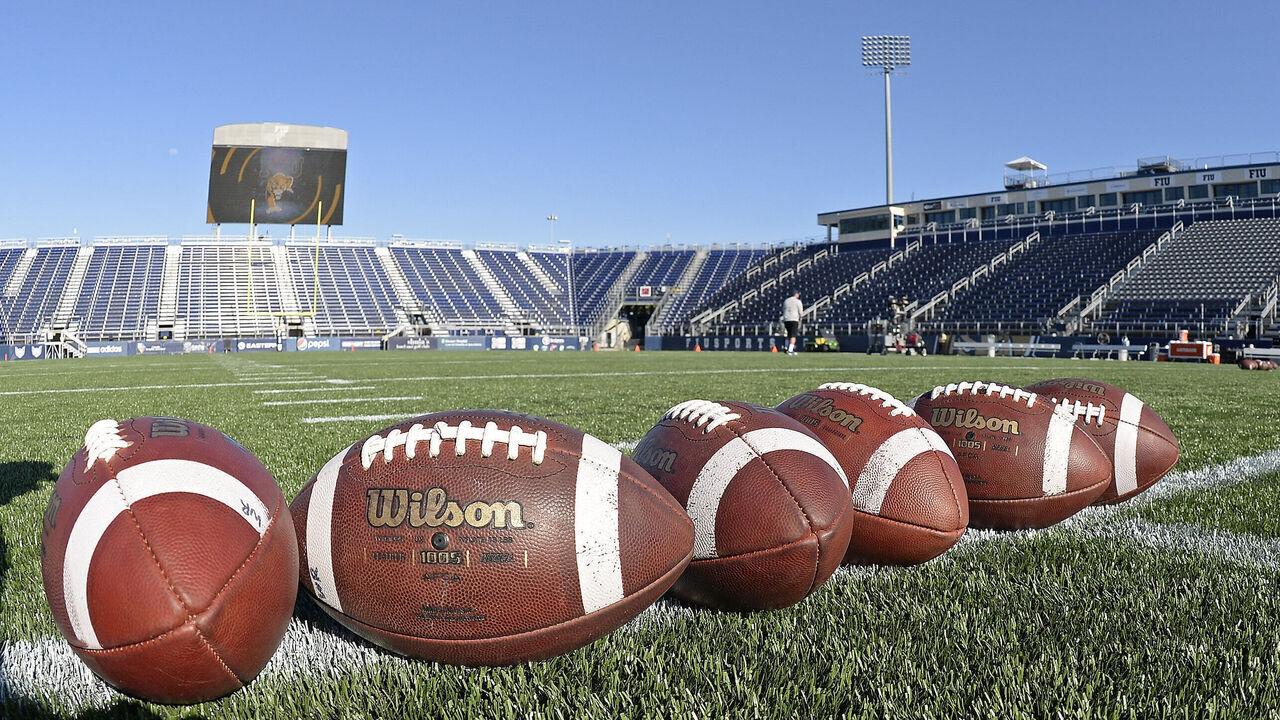 MIAMI, FL - APRIL 7: Footballs are lined up on the field prior to the game as the FIU Golden Panthers held their annual spring game on April 7, 2017, at Riccardo Silva Stadium in Miami, Florida.