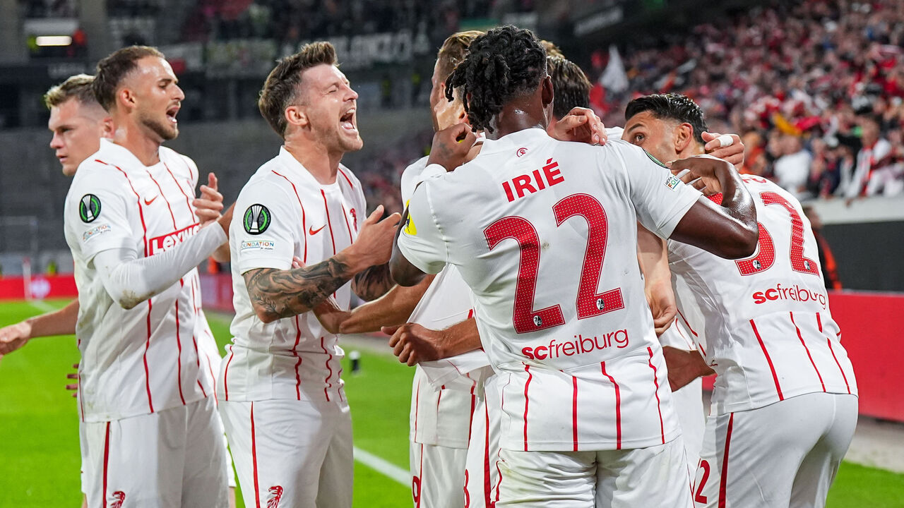 FREIBURG IM BREISGAU, GERMANY - OCTOBER 15: Vincenzo Grifo of SC Freiburg surrounded by teammates celebrates after scoring his team's first goal during the UEFA Conference League 2026/27 League Phase MD1 match between SC Freiburg and FK Jablonec at Stadion am Wolfswinkel on October 15, 2026 in Freiburg im Breisgau, Germany.
