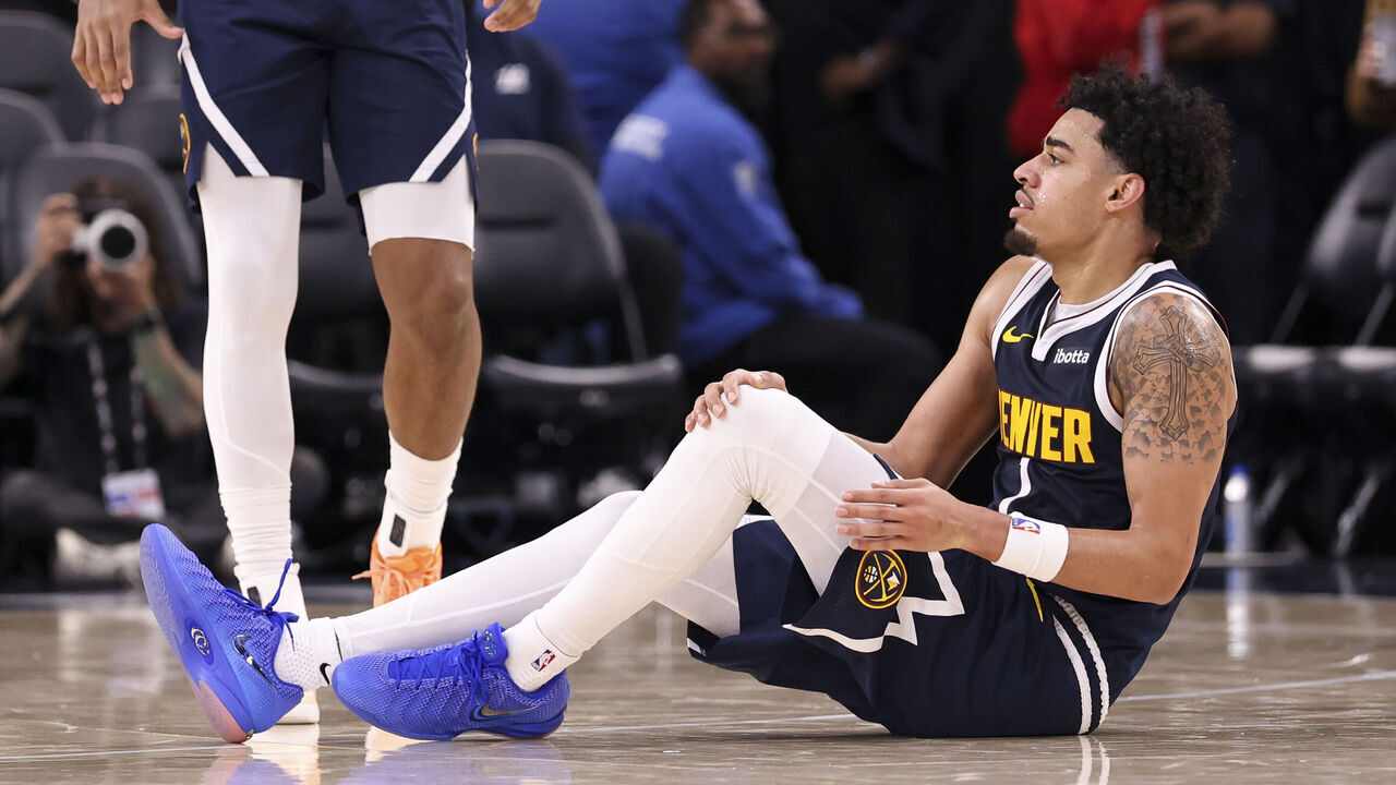 INGLEWOOD, CALIFORNIA - OCTOBER 14: Julian Strawther #1 of the Denver Nuggets reacts after a potential injury during the third quarter of a preseason game against the Los Angeles Clippers at Intuit Dome on October 14, 2026 in Inglewood, California.