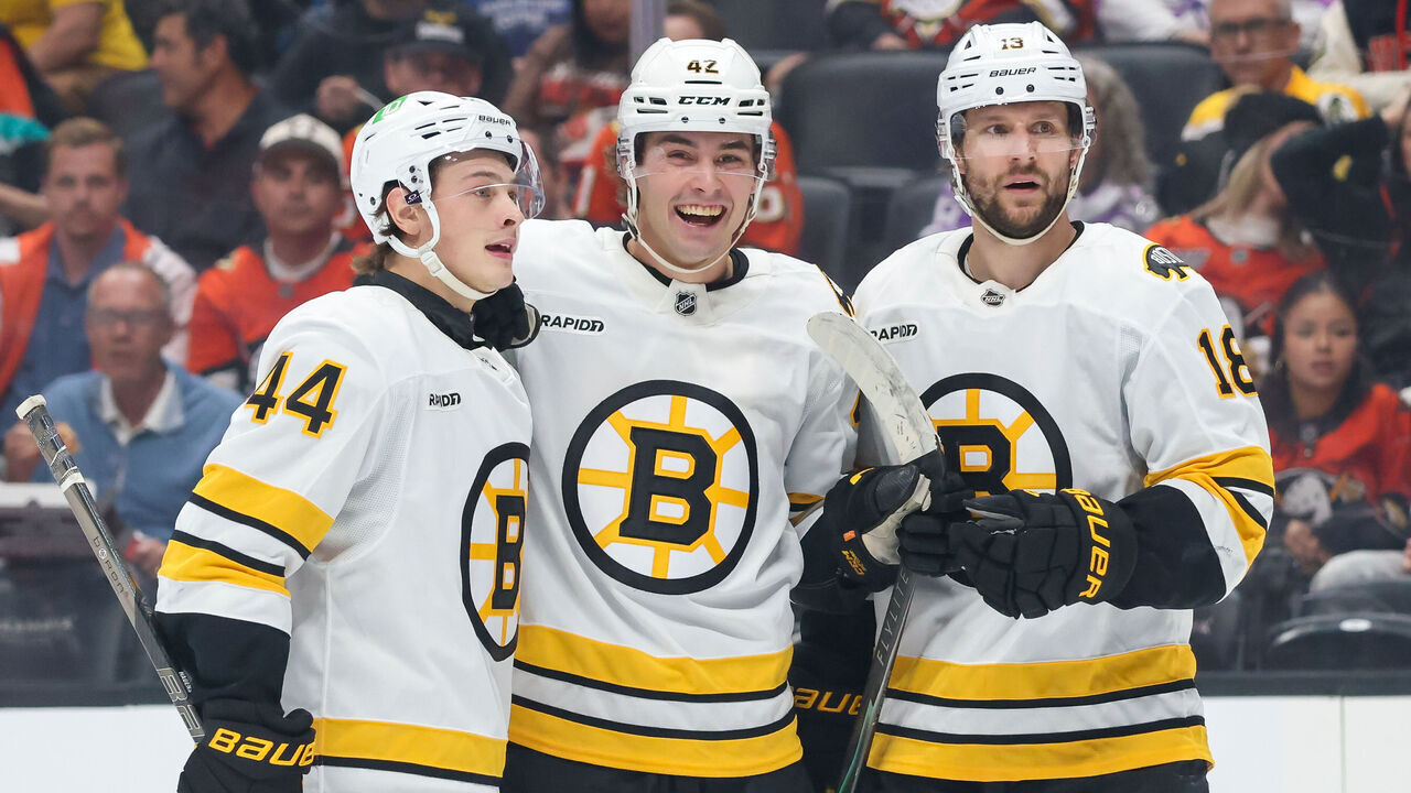 ANAHEIM, CA - OCTOBER 16: Frederic Brunet #42 of the Boston Bruins celebrates scoring his first NHL career goal with James Hagens #44 and Pavel Zacha #18 of the Boston Bruins during the second period of the game against the Anaheim Ducks at Honda Center on October 16, 2026 in Anaheim, California.