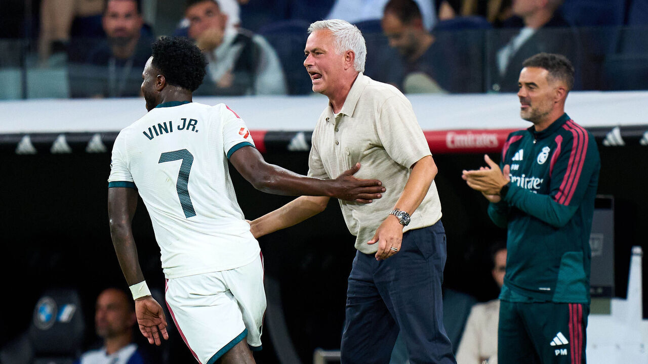 MADRID, SPAIN - AUGUST 26: Vinicius Junior of Real Madrid celebrates with José Mourinho, Head Coach of Real Madrid, after scoring their team's third goal during the LaLiga EA Sports 2026/27 match between Real Madrid and Real Sociedad at Estadio Santiago Bernabeu on August 26, 2026 in Madrid, Spain.