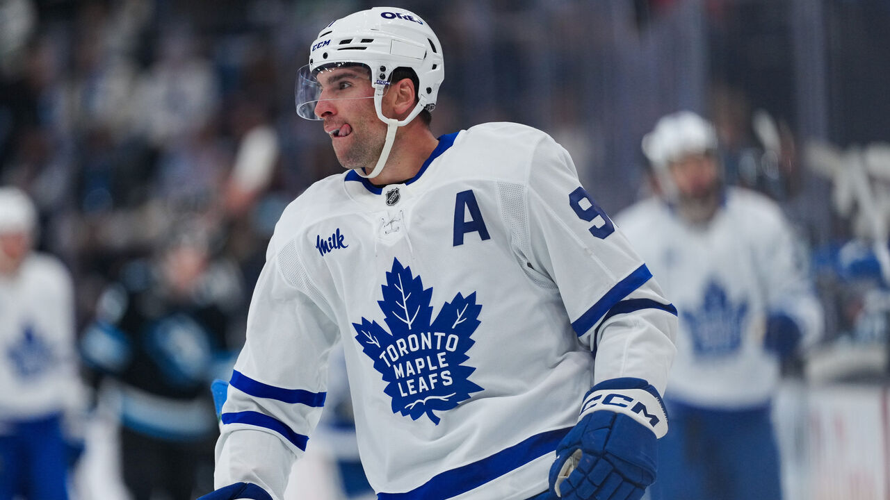 SALT LAKE CITY, UTAH - OCTOBER 13: John Tavares #91 of the Toronto Maple Leafs reacts after scoring a third-period goal against the Utah Mammoth at Delta Center on October 13, 2026 in Salt Lake City, Utah.