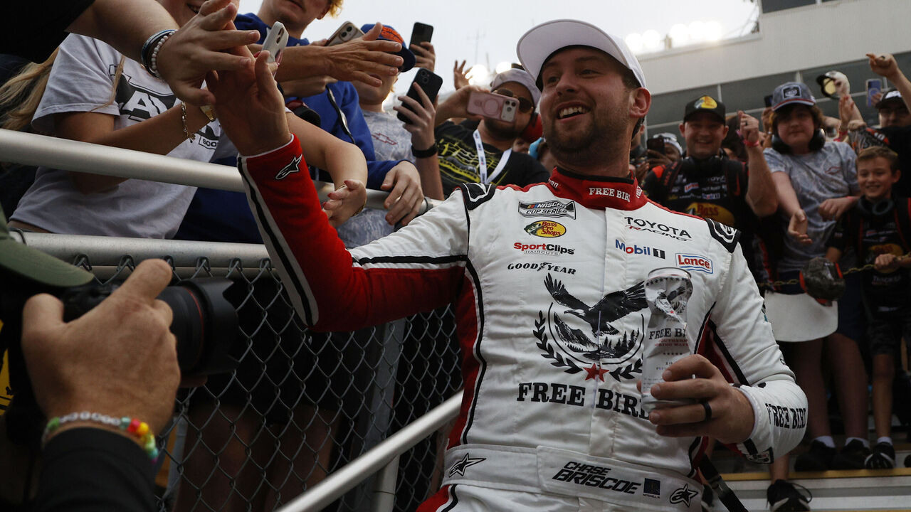 CHARLOTTE, NC - OCTOBER 11: Chase Briscoe (#19 Joe Gibbs Racing Freebird Spring Water Toyota) celebrates after winning the NASCAR Cup Series Playoffs Bank of America 400 race on October 11, 2026 at Charlotte Motor Speedway in Charlotte, NC.