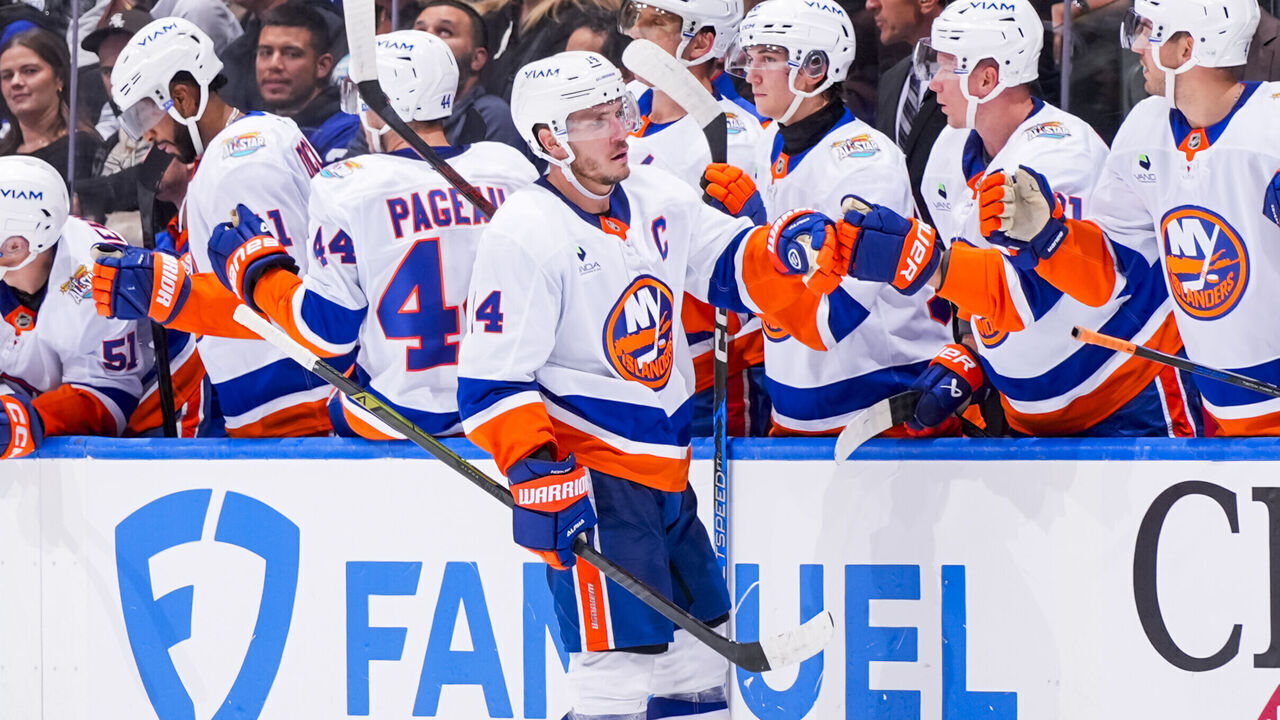 TORONTO, CANADA - OCTOBER 17: Bo Horvat #14 of the New York Islanders celebrates a goal with teammates against the Toronto Maple Leafs during the second period in their NHL game at Scotiabank Arena on October 17, 2026 in Toronto, Canada.