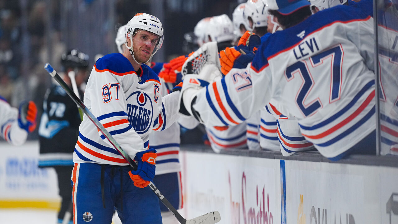 SALT LAKE CITY, UTAH - OCTOBER 17: Connor McDavid #97 of the Edmonton Oilers fist-bumps teammates after scoring a third-period goal against the Utah Mammoth at Delta Center on October 17, 2026 in Salt Lake City, Utah.