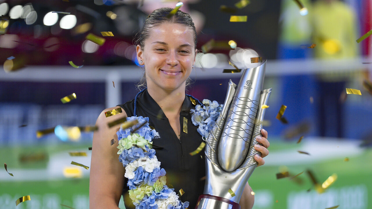 WUHAN, CHINA - OCTOBER 18: Maja Chwalinska of Poland poses for photo with trophy after winning the women's single final match against Sonay Kartal of Great Britain on Day 7 of the Wuhan Open at Optics Valley International Tennis Center on October 18, 2026 in Wuhan, China.