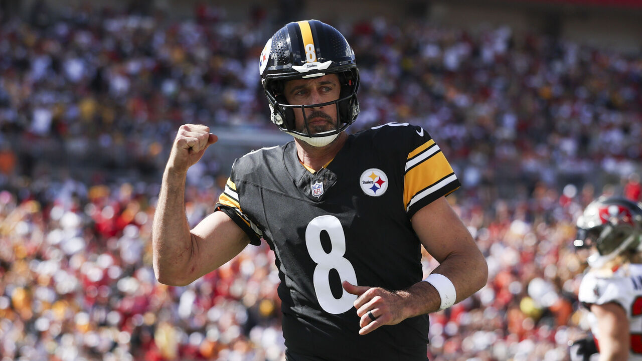 TAMPA, FLORIDA - OCTOBER 18: Aaron Rodgers #8 of the Pittsburgh Steelers celebrates a touchdown during the fourth quarter of an NFL football game against the Tampa Bay Buccaneers at Raymond James Stadium on October 18, 2026 in Tampa, Florida.