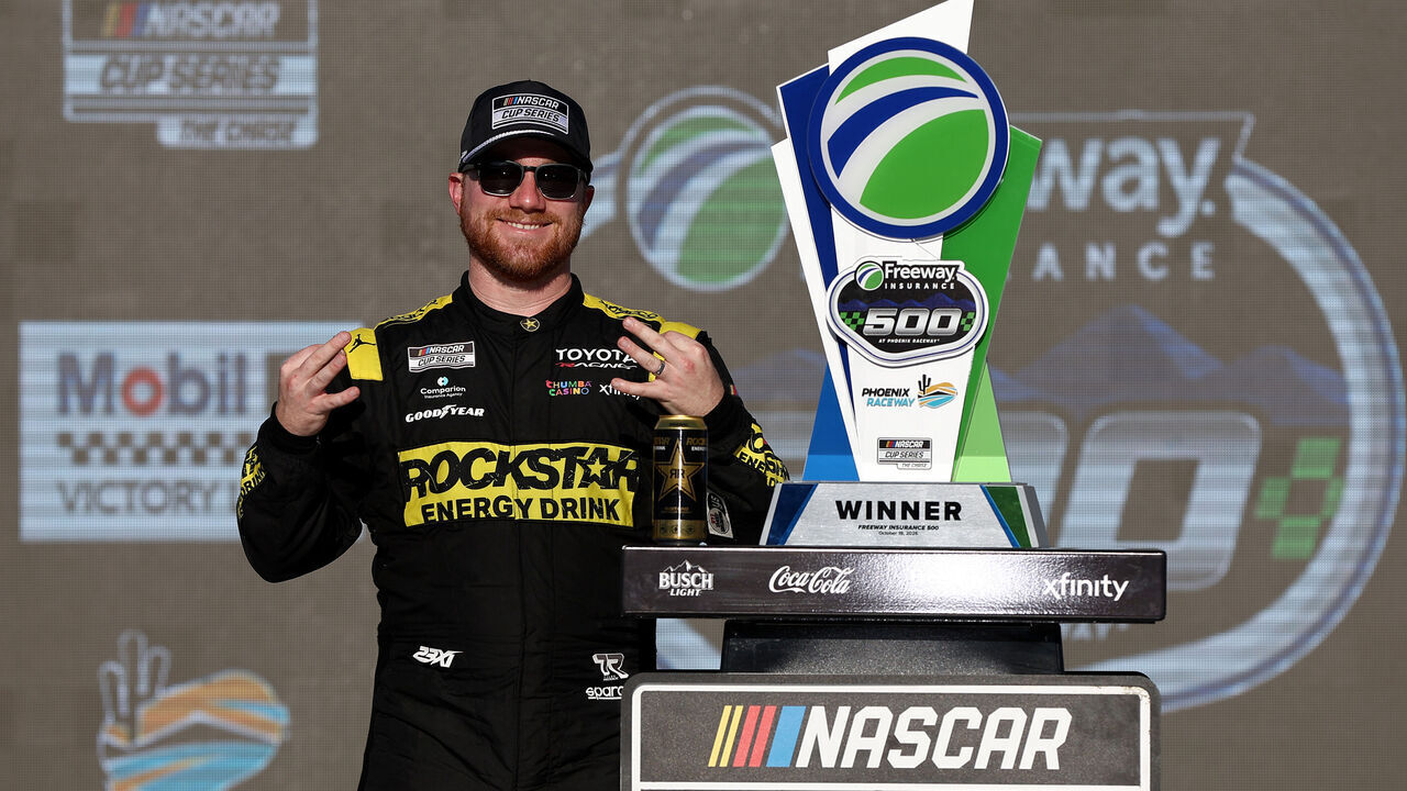 AVONDALE, ARIZONA - OCTOBER 18: Tyler Reddick, driver of the #45 ROCKSTAR ENERGY DRINK Toyota, celebrates in victory lane after winning the NASCAR Cup Series Freeway Insurance 500 at Phoenix Raceway on October 18, 2026 in Avondale, Arizona.