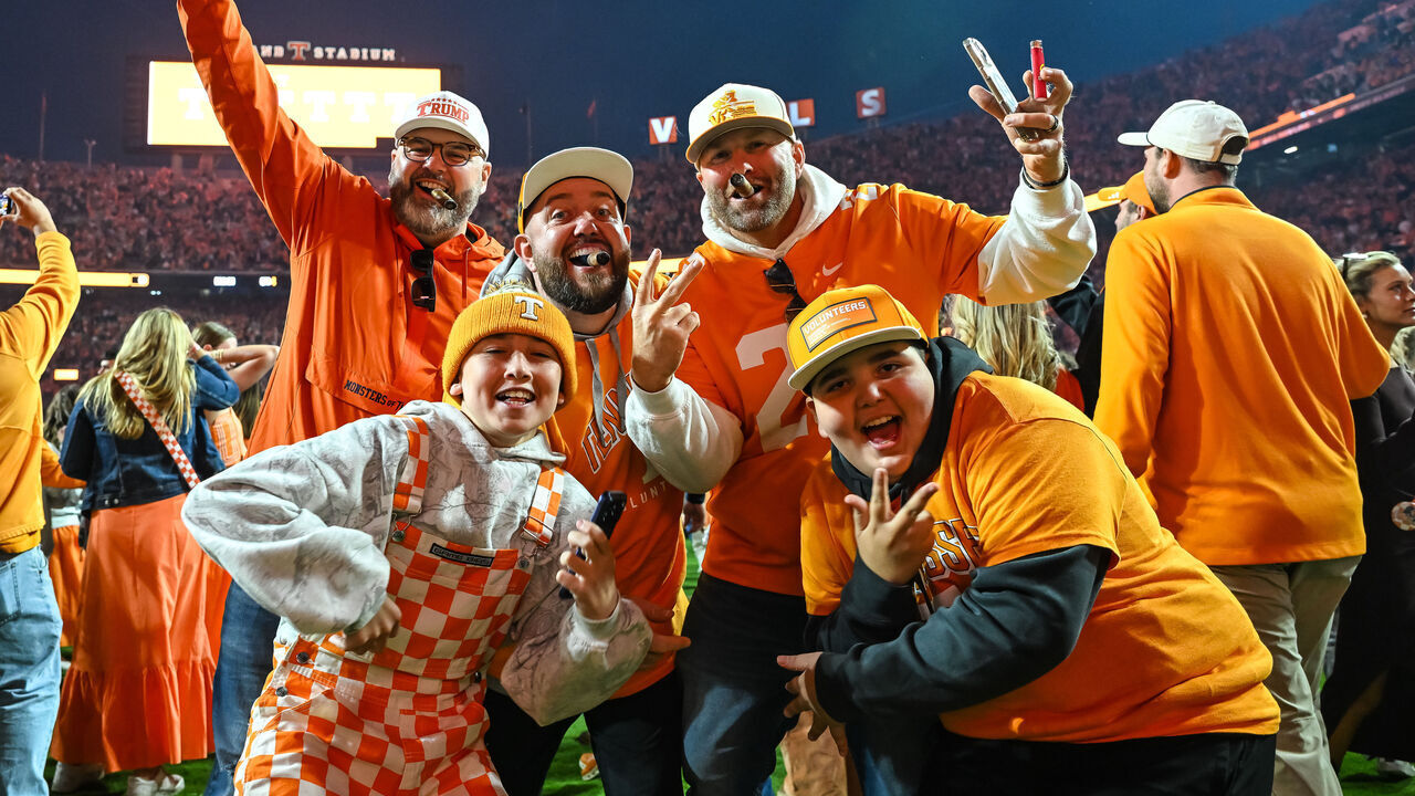 KNOXVILLE, TN - OCTOBER 17: Tennessee Volunteers fans celebrate on the field after a win in the college football game between the Tennessee Volunteers and the Alabama Crimson Tide on October 17, 2026, at Neyland Stadium in Knoxville, TN.