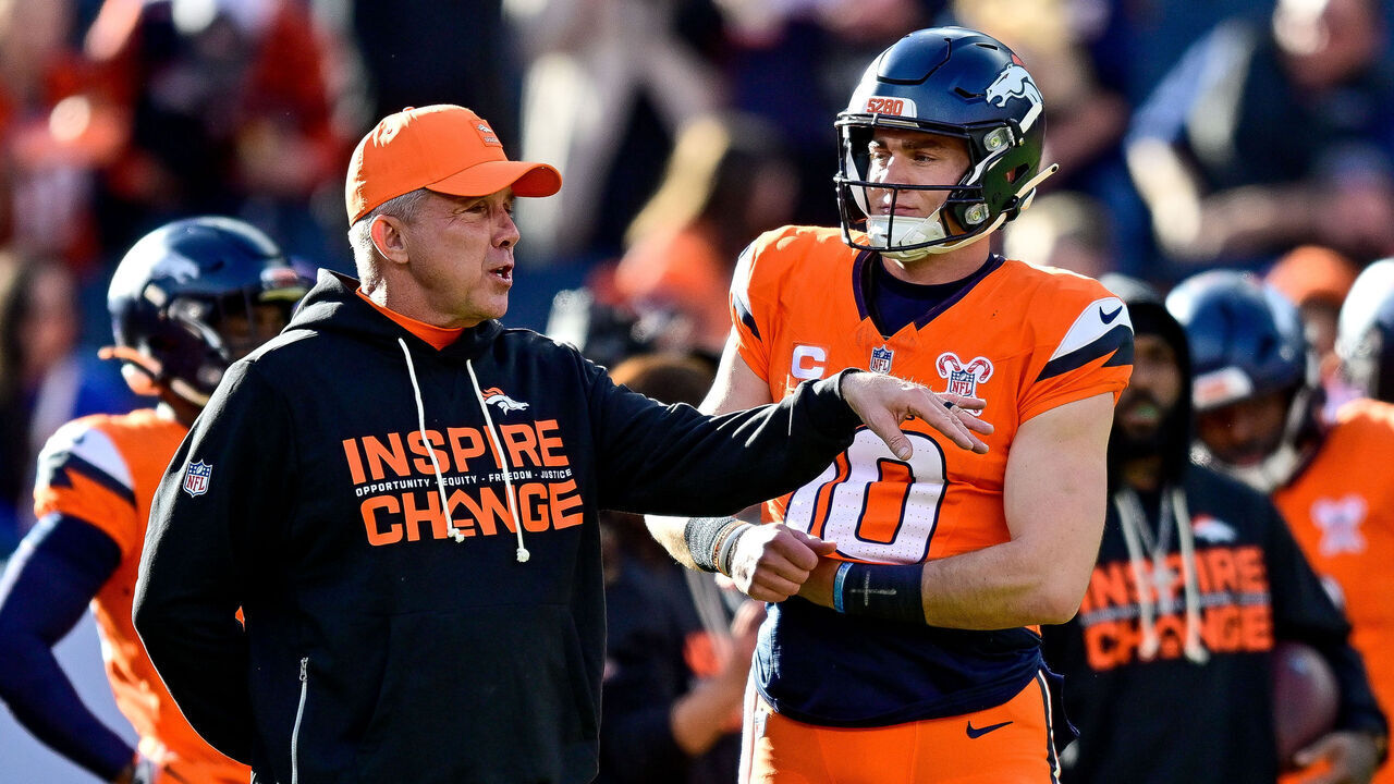 DENVER, CO - DECEMBER 21: Denver Broncos head coach Sean Payton and quarterback Bo Nix (10) have a word before a game between the Jacksonville Jaguars and the Denver Broncos at Empower Field at Mile High on December 21, 2025 in Denver, Colorado.