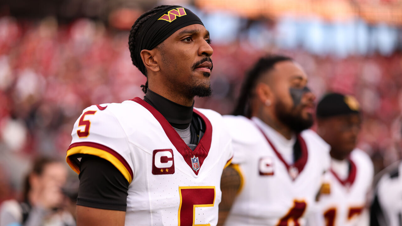 SANTA CLARA, CALIFORNIA - OCTOBER 19: Jayden Daniels #5 of the Washington Commanders stands on the sideline during the national anthem prior to the game against the San Francisco 49ers at Levi's Stadium on October 19, 2026 in Santa Clara, California.