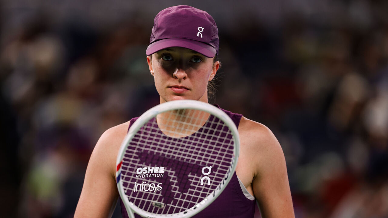 WUHAN, CHINA - OCTOBER 17: Iga Swiatek of Poland returns a shot in the Women's Singles Semi-final against Maja Chwalinska of Poland on Day 6 of the Wuhan Open at Optics Valley International Tennis Center on October 17, 2026 in Wuhan, Hubei Province of China.