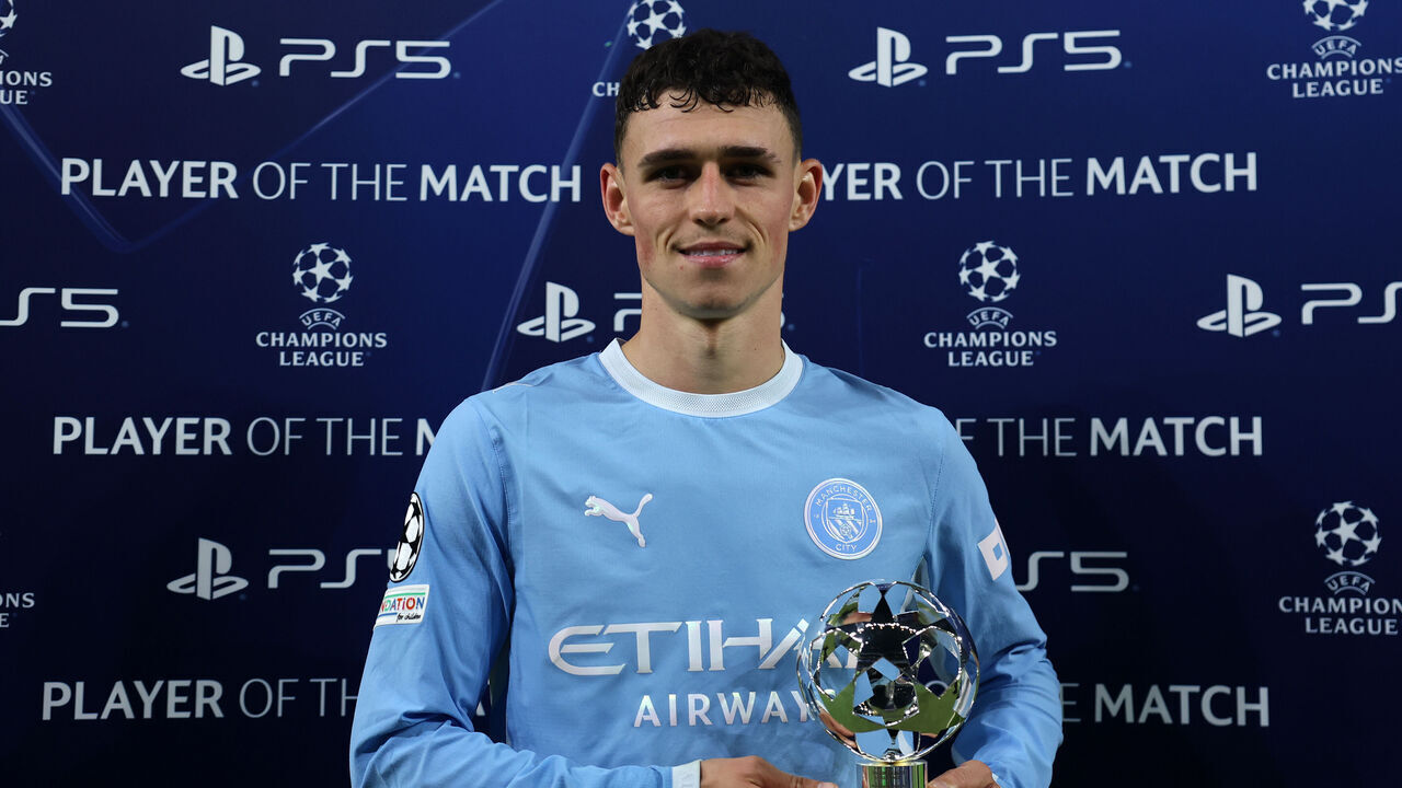 MANCHESTER, ENGLAND - OCTOBER 20: Phil Foden of Manchester City poses for a photo with the Playstation Player of the Match award after the UEFA Champions League 2026/27 League Phase MD3 match between Manchester City and AEK Athens at City of Manchester Stadium on October 20, 2026 in Manchester, England.