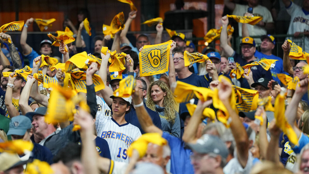 MILWAUKEE, WI - OCTOBER 11: Fans of the Milwaukee Brewers wave rally towels prior to Game One of the National League Championship Series between the Los Angeles Dodgers and the Milwaukee Brewers at American Family Field on Sunday, October 11, 2026 in Milwaukee, Wisconsin.