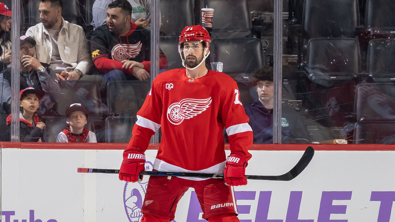 DETROIT, MICHIGAN - OCTOBER 15: Dylan Larkin #71 of the Detroit Red Wings gets set for the face-off against the Philadelphia Flyers during the third period at Little Caesars Arena on October 15, 2026 in Detroit, Michigan. Detroit defeated Philadelphia 2-1.