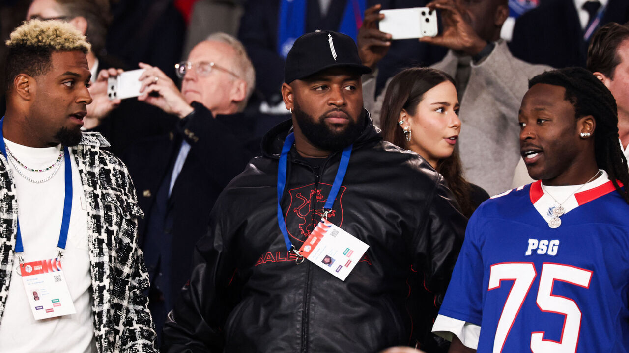 (From L) New Orleans Saints' US defensive end Cameron Jordan, New Orleans' Saints' US defensive lineman Davon Godchaux and New Orleans Saints' US running back Alvin Kamara attend the UEFA Champions League first round day 3 football match between Paris Saint-Germain (PSG) and FC Barcelona at the Parc de Princes stadium in Paris on October 20, 2026.