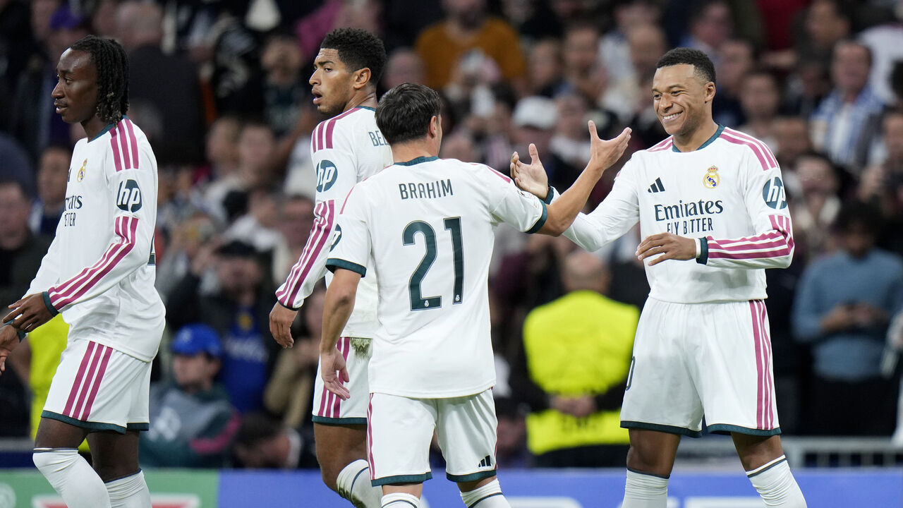 MADRID, SPAIN - OCTOBER 21: Yan Diomande of Real Madrid celebrates scoring his team’s fourth goal with Kylian Mbappe and Brahim Diaz during the UEFA Champions League 2026/27 League Phase MD3 match between Real Madrid C.F. and RB Leipzig at Estadio Santiago Bernabeu on October 21, 2026 in Madrid, Spain.