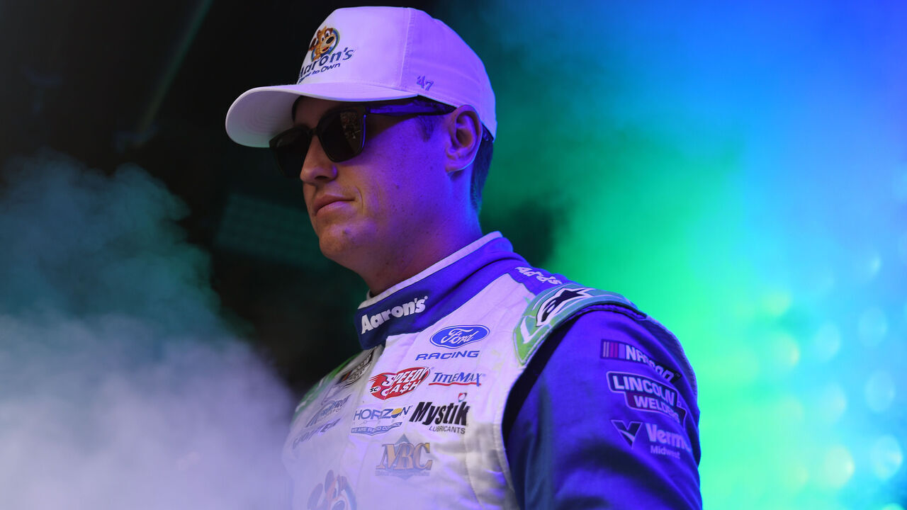 CONCORD, NORTH CAROLINA - OCTOBER 11: Zane Smith, driver of the #38 Aaron's Rent To Own Ford, walks onstage during driver intros prior to the NASCAR Cup Series Bank of America 400 at Charlotte Motor Speedway on October 11, 2026 in Concord, North Carolina.