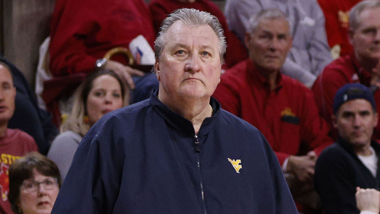 AMES, IA - FEBRUARY 27: Head coach Bob Huggins of the West Virginia Mountaineers coaches from the bench in the second half of play at Hilton Coliseum on February 27, 2023 in Ames, Iowa. The West Virginia Mountaineers won 72-69 over the Iowa State Cyclones.