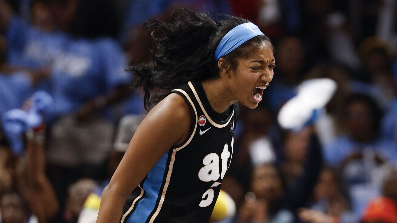 Atlanta Dream forward Angel Reese (5) reacts after making a 3-point basket against the Golden State Valkyries during the first half of the WNBA Finals Game 3 at State Farm Arena, Wednesday, Oct. 21, 2026, in Atlanta.