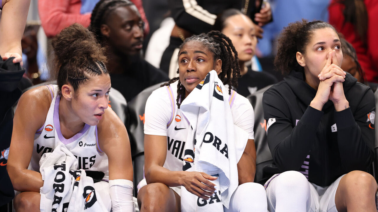 ATLANTA, GEORGIA - OCTOBER 21: Veronica Burton #22, Tiffany Hayes #15, and Janelle Salaun #13 of the Golden State Valkyries react from the bench during the fourth quarter in game three of the WNBA Finals against the Atlanta Dream at State Farm Arena on October 21, 2026 in Atlanta, Georgia.