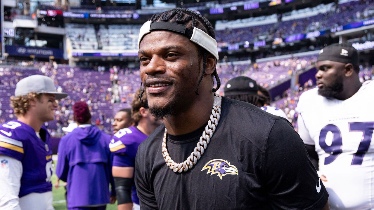 MINNEAPOLIS, MINNESOTA - AUGUST 22: Lamar Jackson #8 of the Baltimore Ravens walks onto the field after an NFL football game against the Minnesota Vikings at U.S. Bank Stadium on August 22, 2026 in Minneapolis, Minnesota.