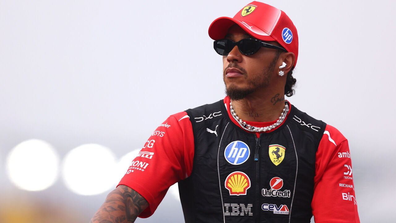 SINGAPORE, SINGAPORE - OCTOBER 11: Lewis Hamilton of Great Britain and Scuderia Ferrari on the drivers parade prior to the F1 Grand Prix of Singapore at Marina Bay Street Circuit on October 11, 2026 in Singapore, Singapore.