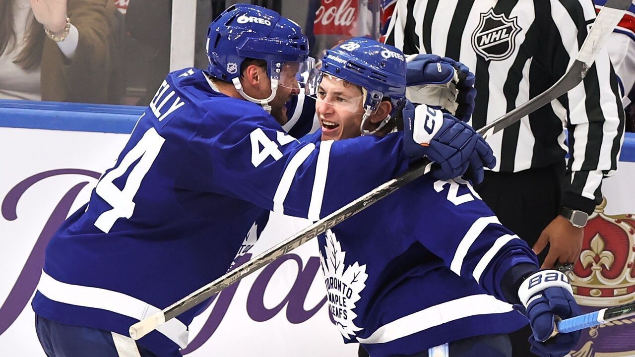 TORONTO, ON - October 22 In third period action, Troy Stecher of the Leafs scored the winning goal in the dying seconds of the game and celebrates with Morgan Rielly of the Leafs.The Toronto Maple Leafs beat the New York Rangers 5-4 in NHL hockey action at the Scotiabank Arena.October 22 2026 Richard Lautens/Toronto Star (Richard Lautens/Toronto Star via Getty Images)