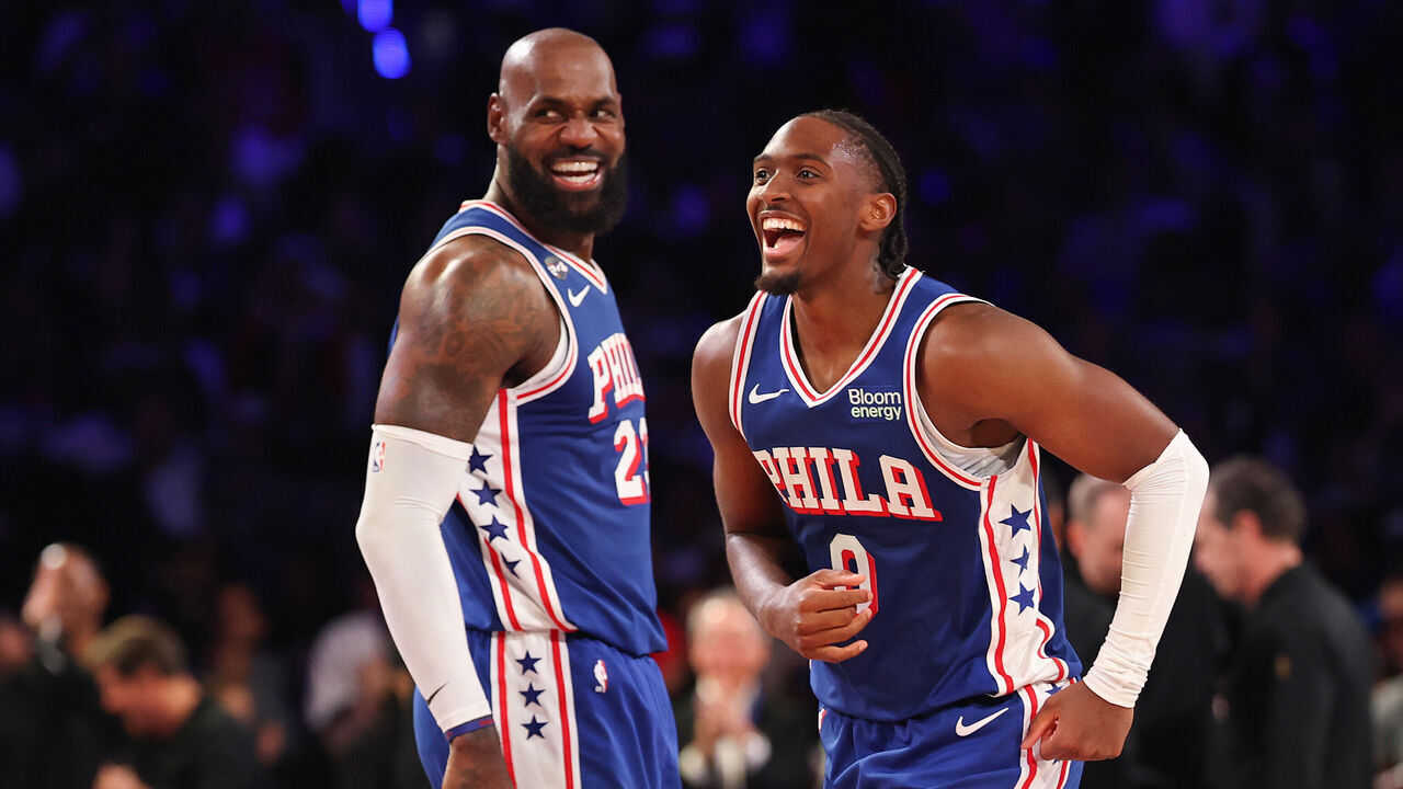 PHILADELPHIA, PENNSYLVANIA - OCTOBER 22: Tyrese Maxey #0 and LeBron James #23 of the Philadelphia 76ers react during the fourth quarter of a game against the Cleveland Cavaliers at Xfinity Mobile Arena on October 22, 2026 in Philadelphia, Pennsylvania.