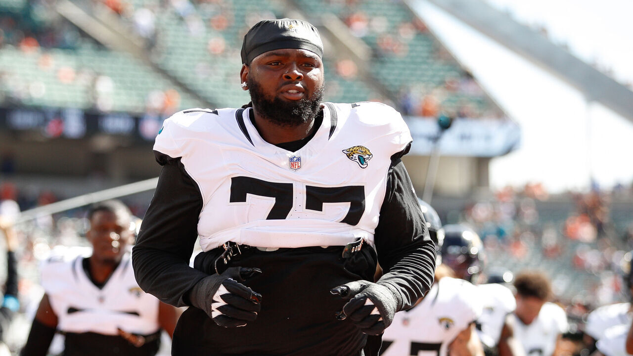 CINCINNATI, OH - OCTOBER 04: Jacksonville Jaguars offensive tackle Anton Harrison (77) jogs off the field before the game between the Jacksonville Jaguars and the Cincinnati Bengals at Paycor Stadium on October 4, 2026 in Cincinnati, OH.